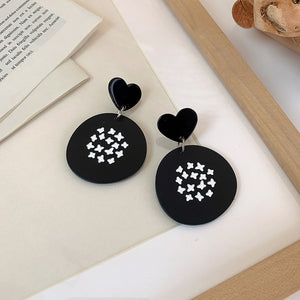 E1721 Black Acrylic Heart Round Twinkle Design Earrings - Iris Fashion Jewelry