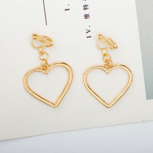 E1404 Gold Hollow Heart Clip On Earrings - Iris Fashion Jewelry