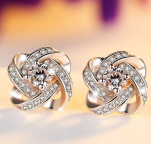 E1818 Silver Rhinestone Knot Design Stud Earrings - Iris Fashion Jewelry