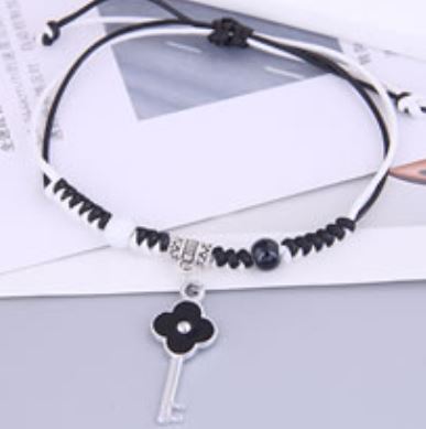 B681 Silver Black & White Cord Flower Key Bracelet - Iris Fashion Jewelry