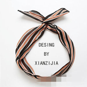 H76 Black Orange and White Striped Pattern Wire & Cloth Hair Band - Iris Fashion Jewelry